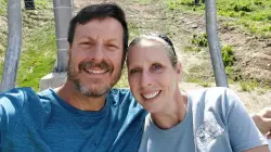 Alaska man survives being pinned face-down by 700-pound boulder in creek after help from his wife